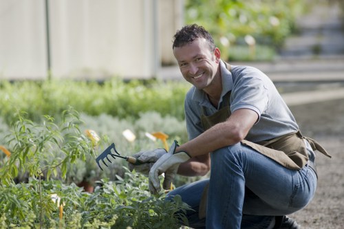Workers assessing a garden site for hazards